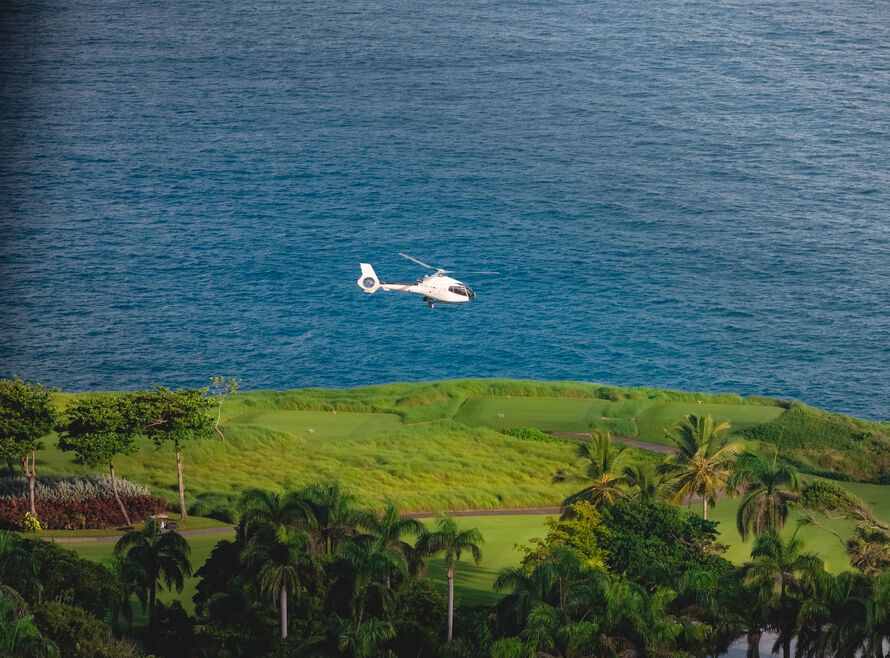 Helicopter flying in the Caribbean