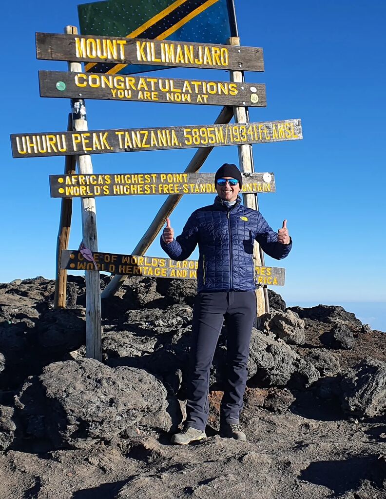 Erik Hasselman on the summit of Kilimanjaro