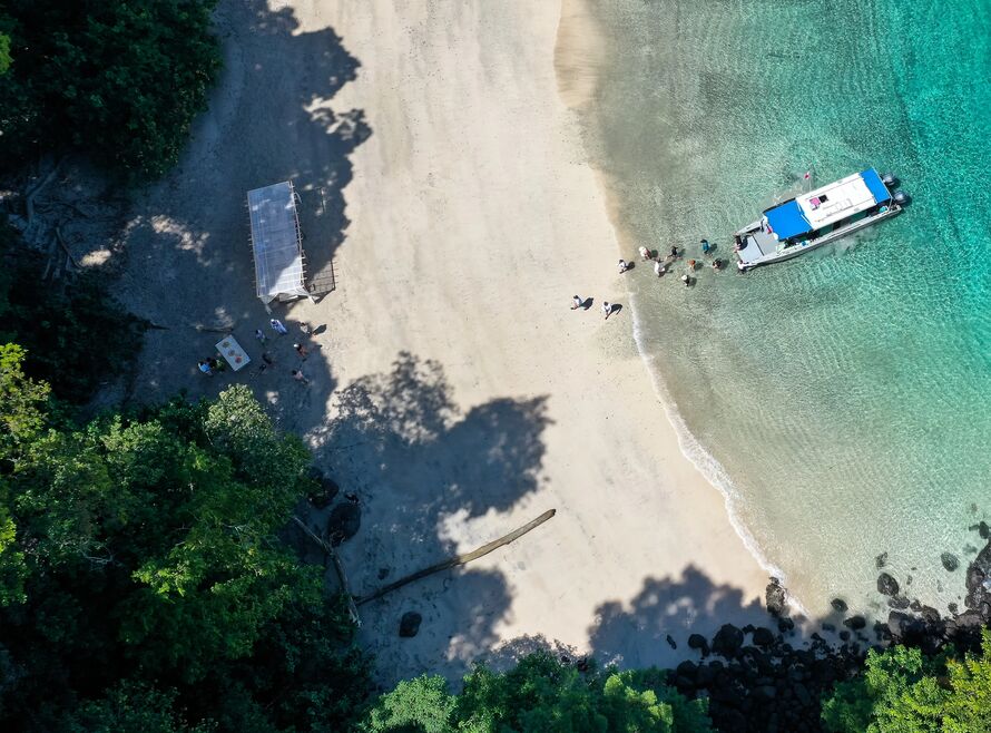 Group arrives at beach lunch on an uninhabited island